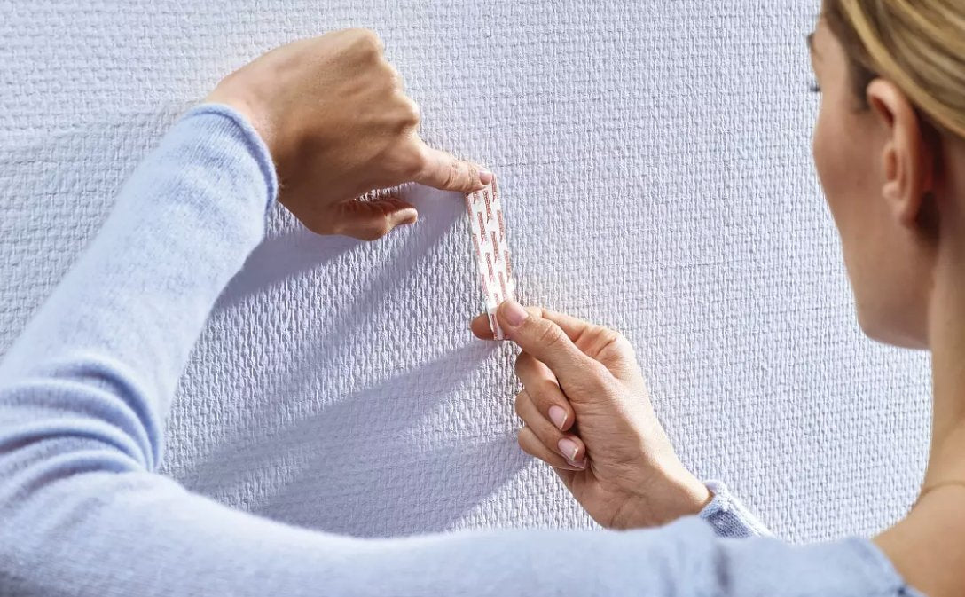 Tesa Pack De 2 Clavo Adhesivo Ajustable Hasta 1kg Para Pared Lisa