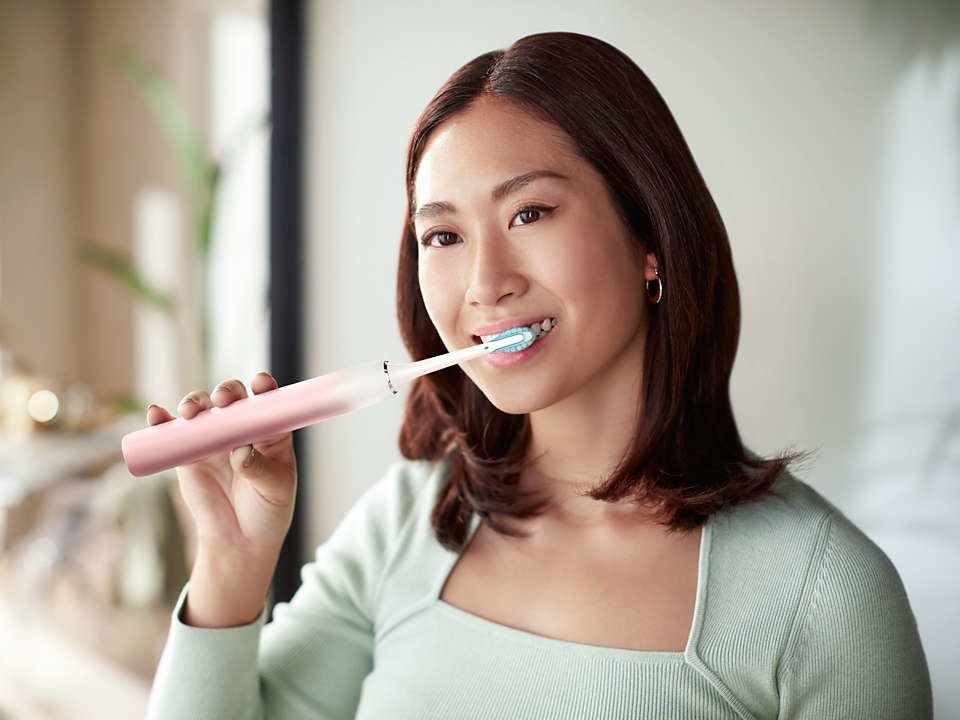 EAN 8720689000963 - Philips Sonicare HX9911/84 cepillo eléctrico para dientes Adulto Cepillo dental sónico Rosa, Blanco imagen 4