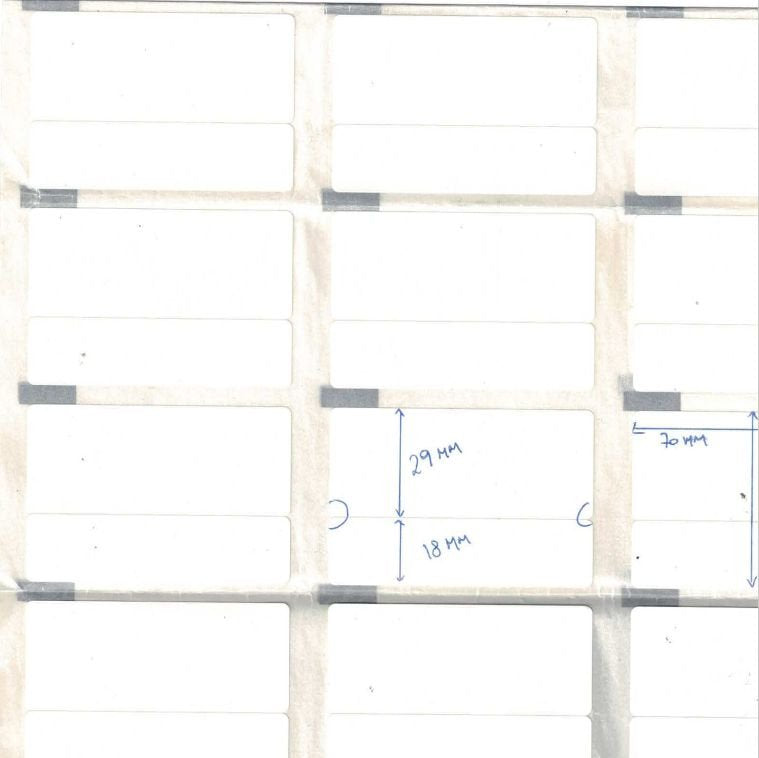 Label 70x30 - Core 25. White. Top-Coated. Dt. Removable.