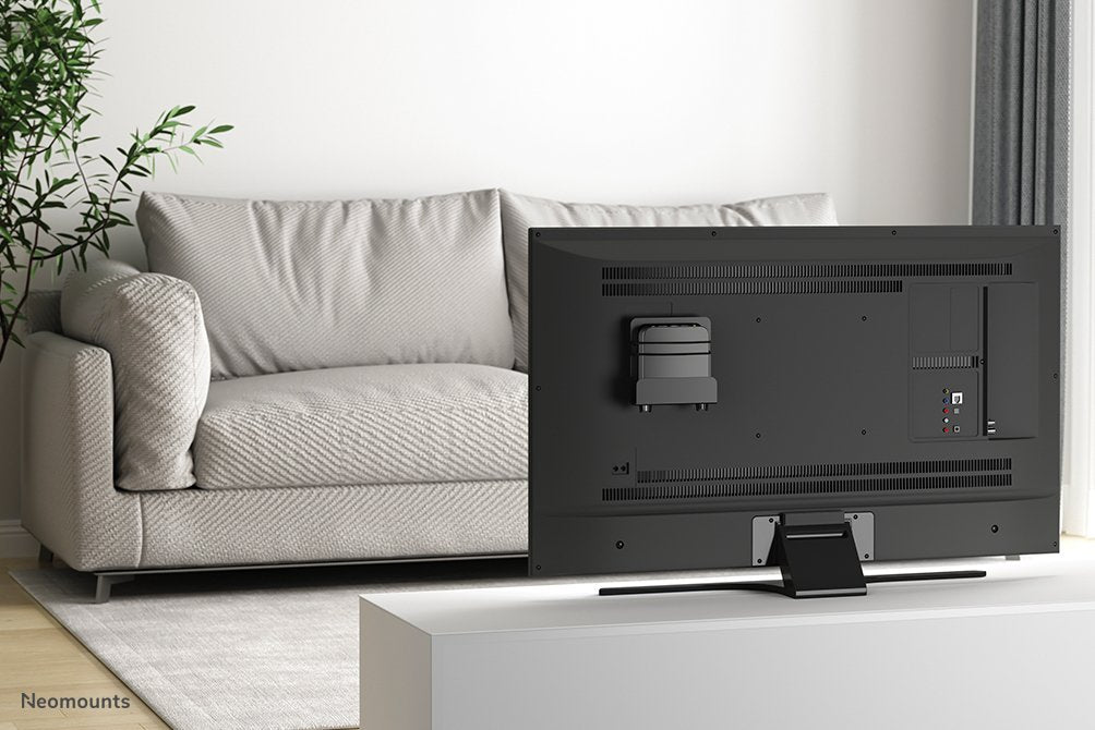 Soporte Universal Para Reproductor Multimedia Con Profundidad Ajustable (3,2-4,6 Cm) 5kg Awl-440bl Neomounts